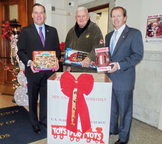 Register O'Donnell Delivers Donated Toys to Toys for Tots