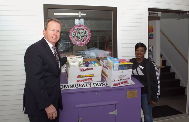 Register of Deeds William P. O’Donnell delivers food donations collected during the Registry of Deeds Annual Holiday Food Drive to Yianna Zicherman, Warehouse Manager, at the franklin food Pantry.